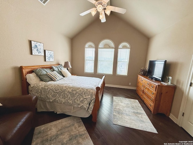 bedroom with lofted ceiling, dark wood-type flooring, and ceiling fan