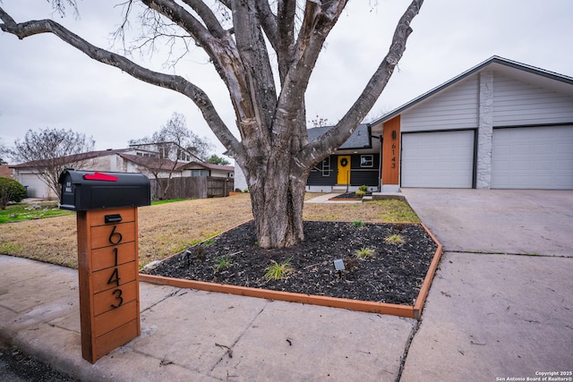 view of yard featuring a garage