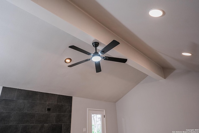 interior details featuring beamed ceiling and ceiling fan