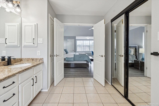 bathroom featuring vanity and tile patterned flooring