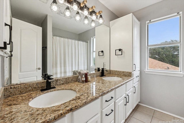 bathroom featuring tile patterned floors and vanity