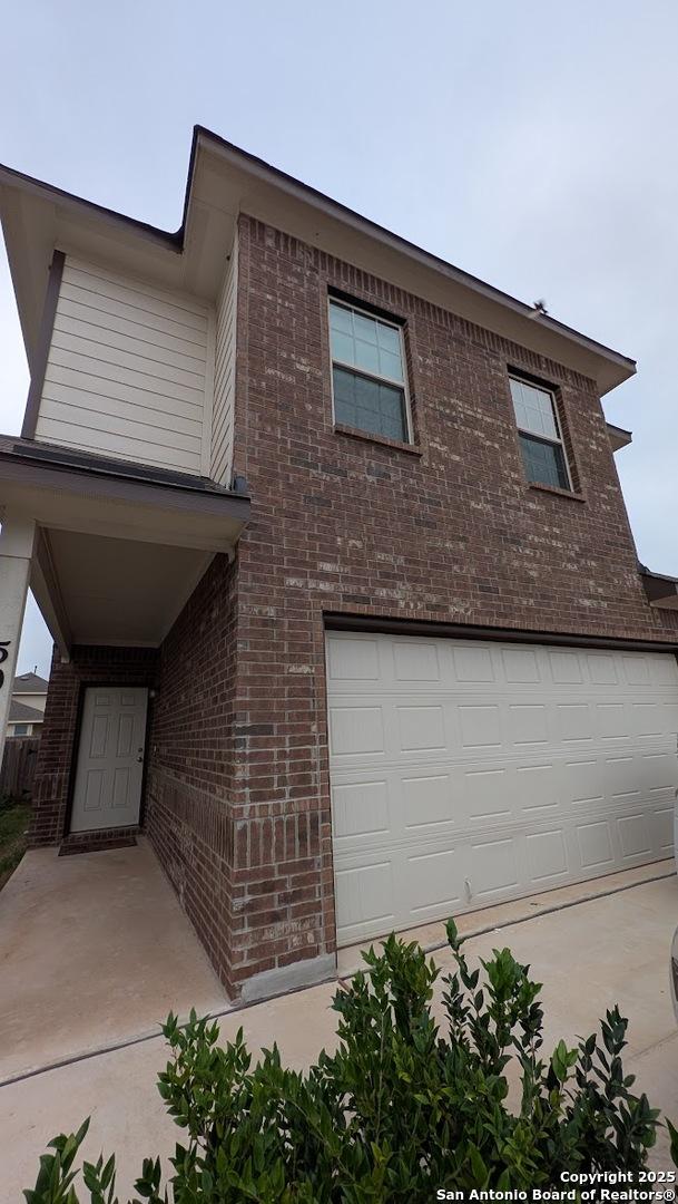 view of front of property featuring a garage