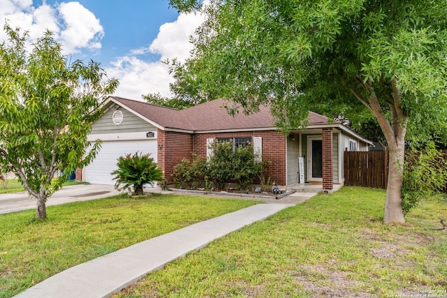 ranch-style home featuring a garage and a front yard