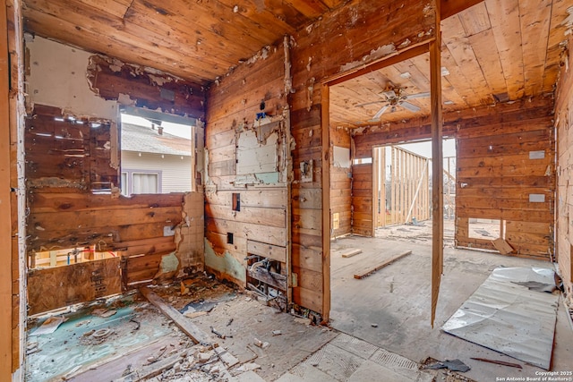 misc room with wood ceiling and ceiling fan