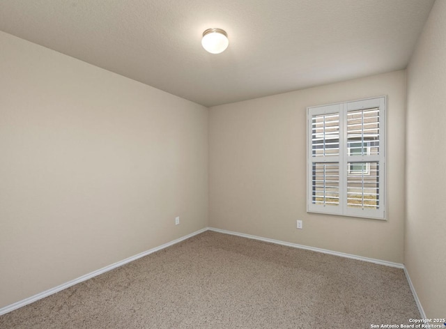 unfurnished room featuring carpet floors