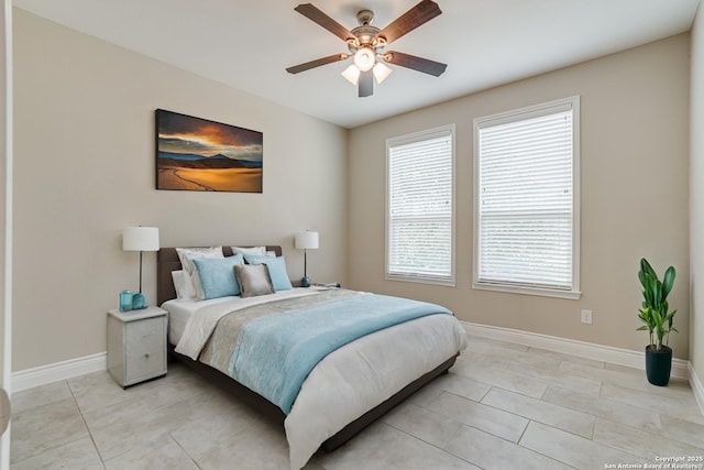 bedroom with light tile patterned floors and ceiling fan