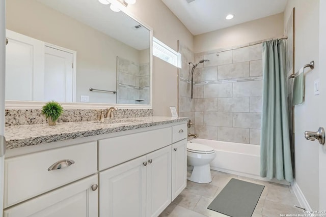 full bathroom featuring shower / tub combo, vanity, and toilet