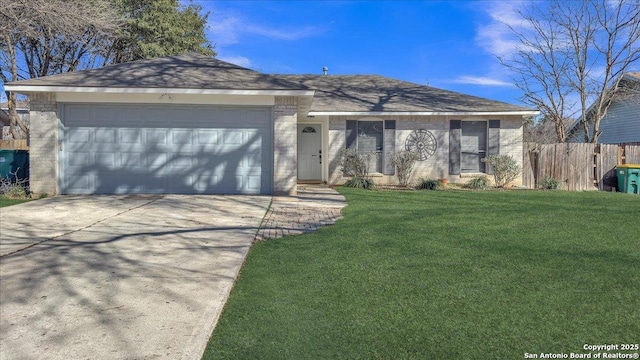 ranch-style house featuring a garage and a front lawn