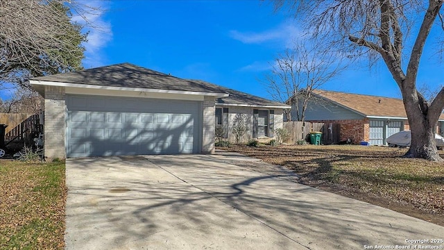 single story home with a garage