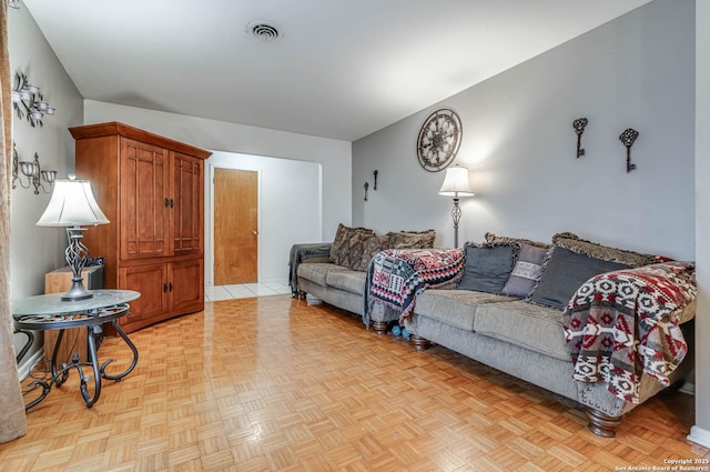 living room featuring light parquet floors