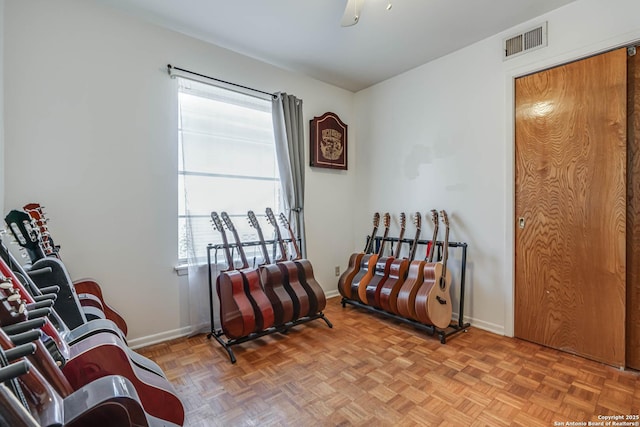 living area with light parquet flooring