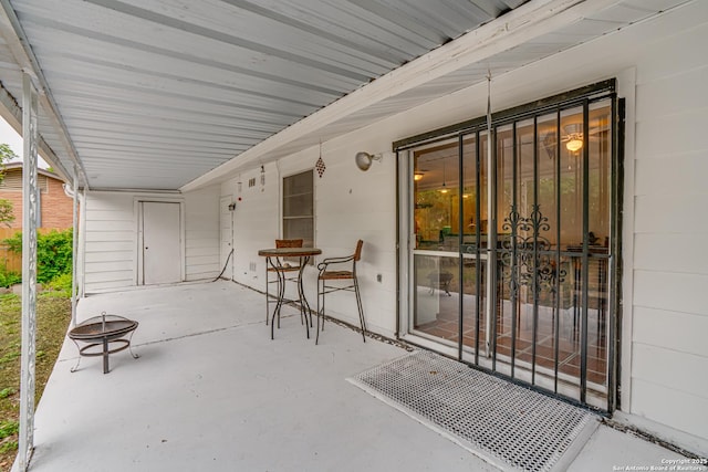 view of patio featuring a fire pit