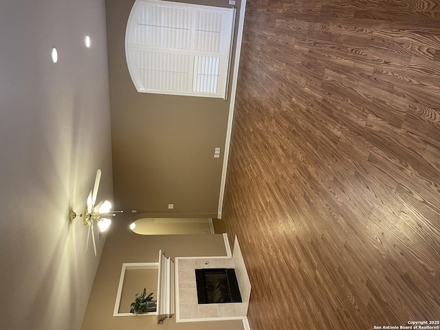 interior space featuring a tile fireplace