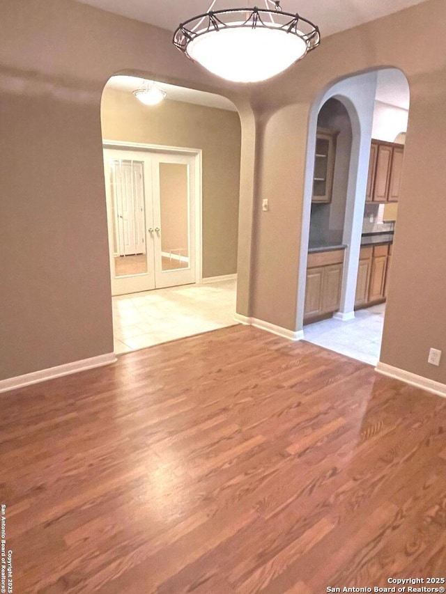 spare room featuring light hardwood / wood-style flooring