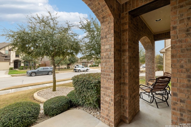 view of patio featuring a porch