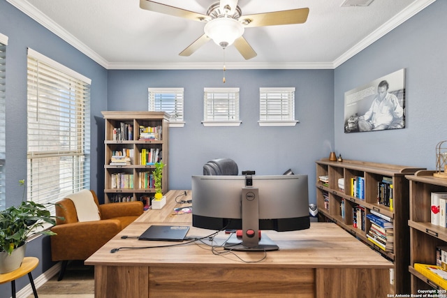 office featuring crown molding and ceiling fan