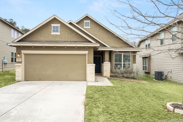 craftsman-style home with a garage, central AC, and a front lawn