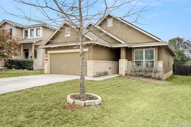 craftsman-style house with a garage and a front lawn