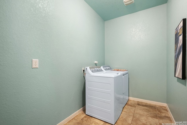 laundry room with independent washer and dryer