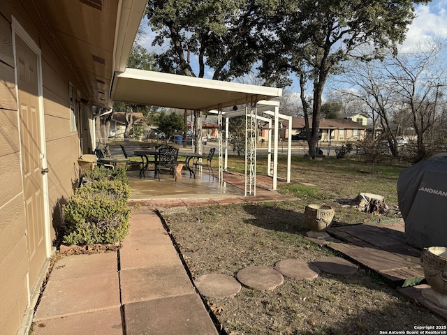 view of yard with a patio area