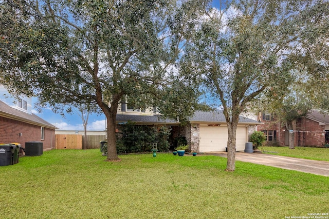 view of front of house featuring a garage, central air condition unit, and a front lawn