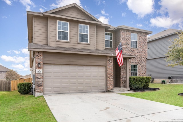 front of property featuring a garage and a front yard