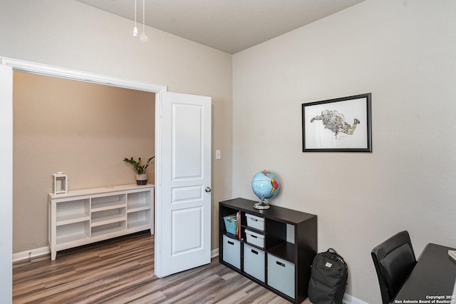 office area with wood-type flooring