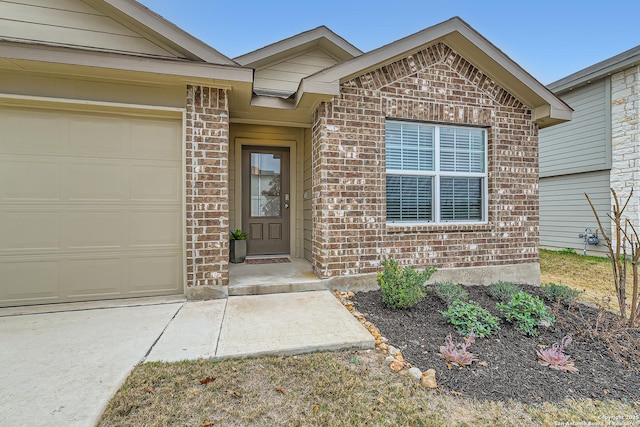 doorway to property featuring a garage