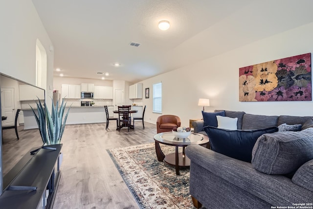 living room featuring light hardwood / wood-style floors