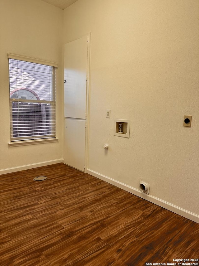 laundry area featuring hookup for a washing machine, hookup for an electric dryer, and dark hardwood / wood-style flooring