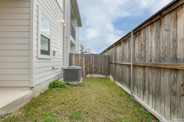 view of yard featuring central AC unit