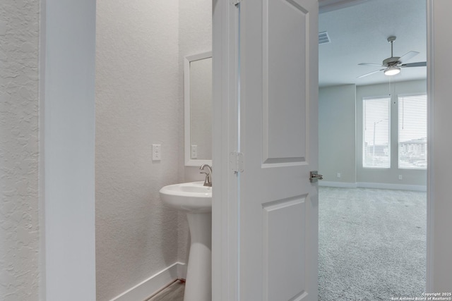 bathroom with sink and ceiling fan