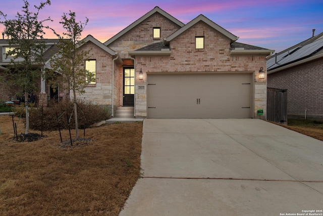 view of front of home featuring a garage