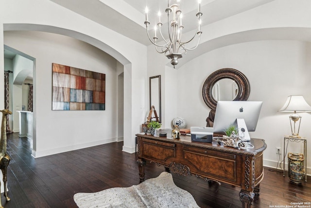 office area with dark hardwood / wood-style flooring and a notable chandelier