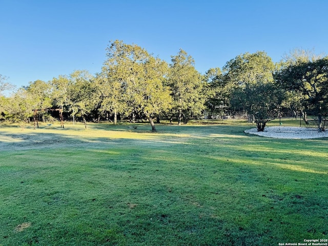 surrounding community featuring a lawn