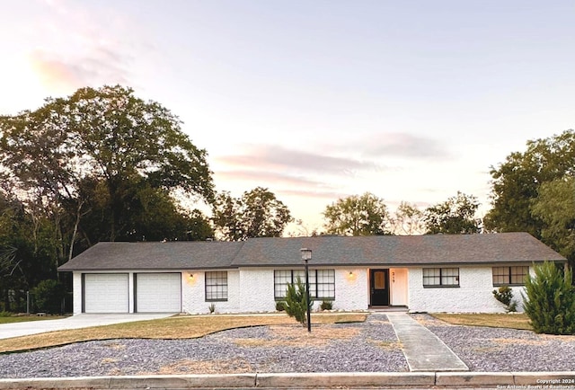 single story home with a garage