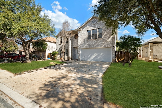 view of front facade with a garage and a front yard