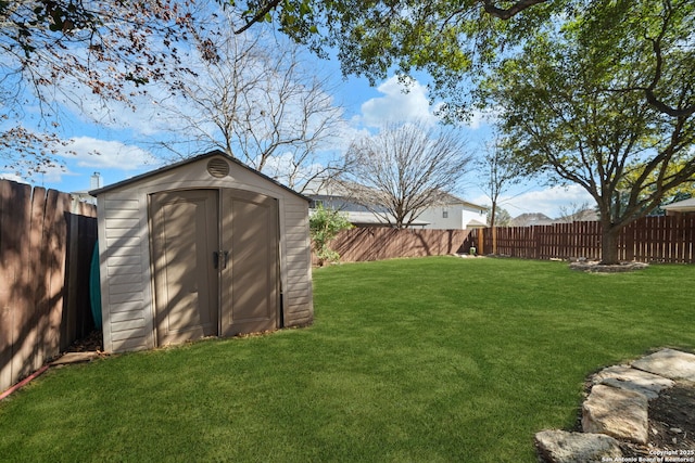 view of yard with a storage shed