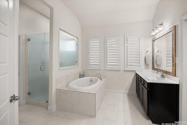 full bath featuring marble finish floor, vaulted ceiling, a shower stall, vanity, and a bath