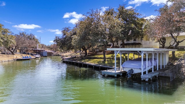 dock area featuring a water view