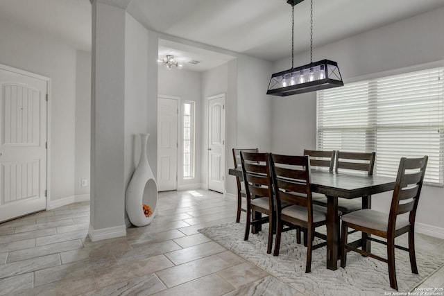 dining room with plenty of natural light