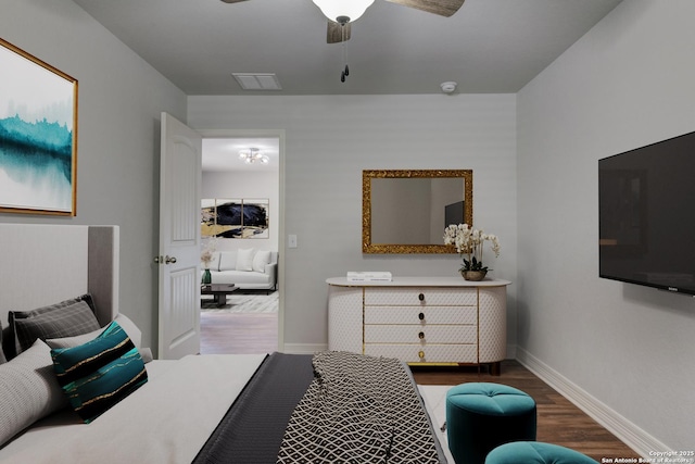 bedroom featuring wood-type flooring and ceiling fan