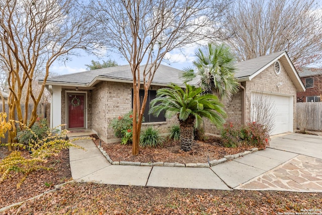 single story home with a garage