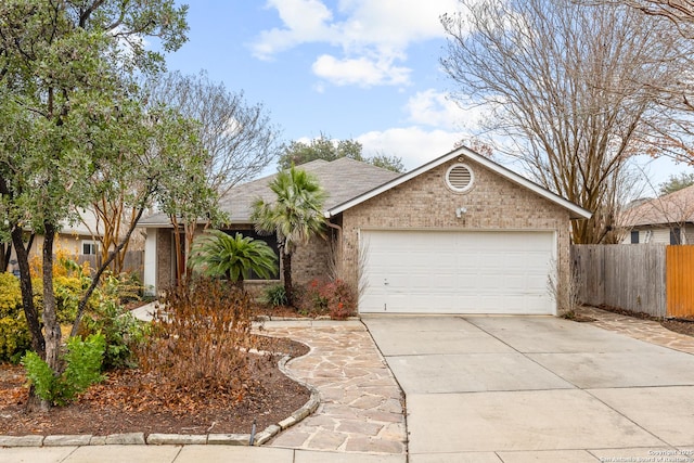 single story home featuring a garage