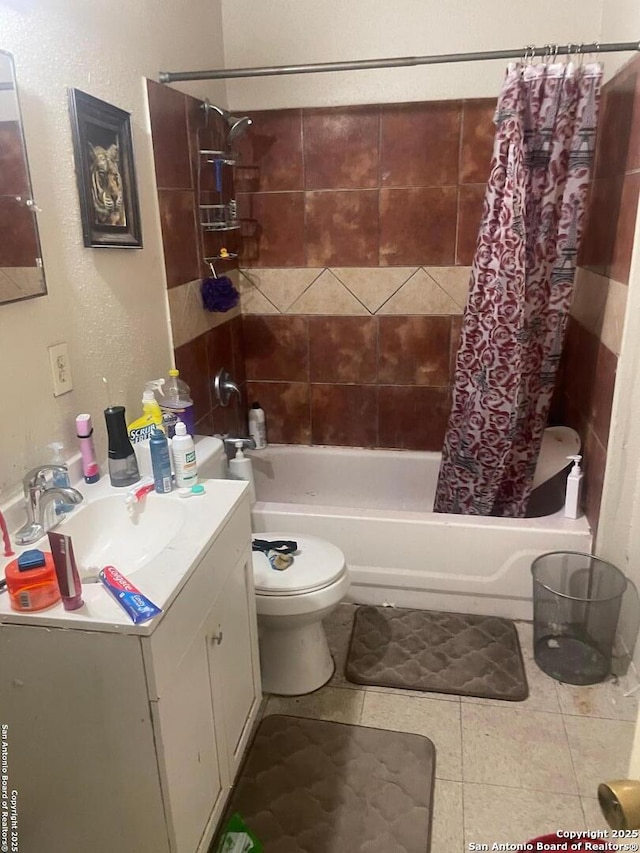 full bathroom with shower / bathtub combination with curtain, vanity, tile patterned floors, and toilet