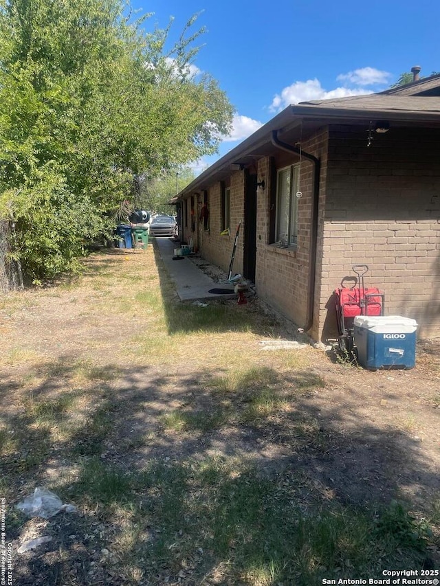 view of home's exterior featuring a lawn