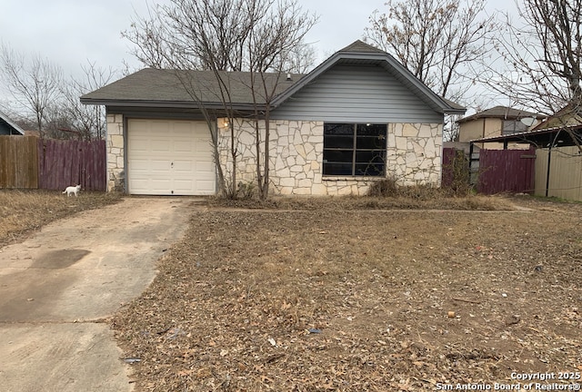 view of front of property featuring a garage