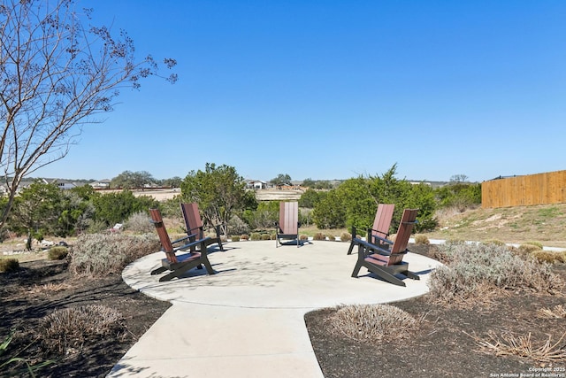 view of patio featuring fence