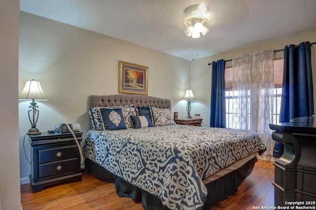 bedroom with wood-type flooring