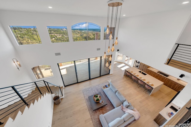 living room with light hardwood / wood-style floors